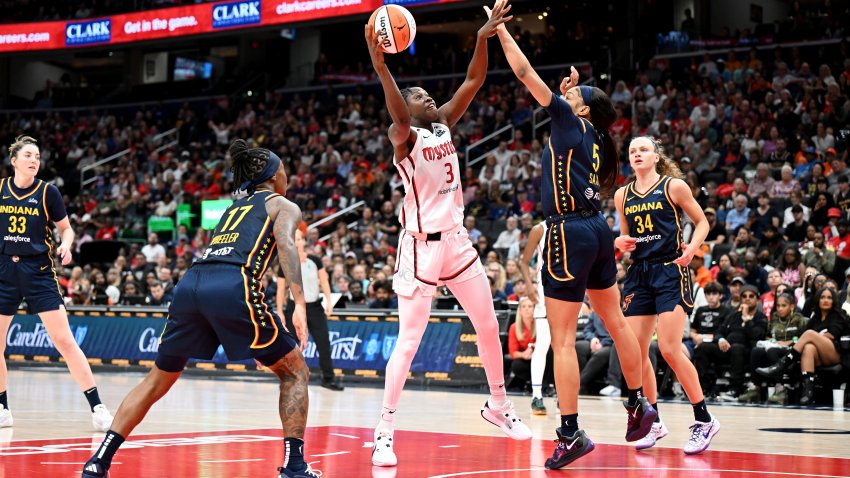 Sika Kone shoots in the fourth quarter against Victaria Saxton at Capital One Arena.