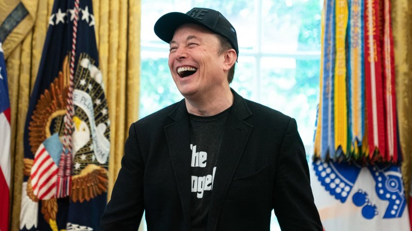 Elon Musk laughs during a press event with US President Donald Trump in the Oval Office of the White House in Washington, DC, on May 30, 2025.